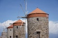 Medieval windmills of Rhodes town. Mandraki Harbour in the Dodecanese island of Rhodes Greece