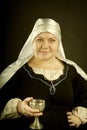 Medieval woman with goblet Royalty Free Stock Photo