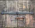 Medieval wooden door on castle antiquity castle iron bolt door lock handle middle ages handmade craft