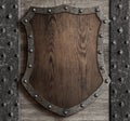 Medieval wooden shield on castle gate 3d illustration Royalty Free Stock Photo