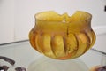 Medieval yellow coloured ribbed glass bowl.