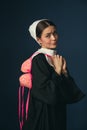 Medieval young woman as a nun with bra Royalty Free Stock Photo