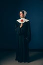Medieval young woman as a nun Royalty Free Stock Photo