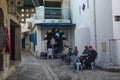 Medina of Sousse, old men chatting and drinking coffee on the street near cafe