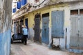 Medina street view with a man and a wooden cart