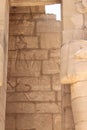 Medinet Habu. Close to Ramesseum and Temple of Hathor at Dendera. Large sculptures of pharaohs. Hieroglyphics. Luxor, Egypt. Royalty Free Stock Photo