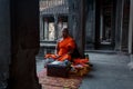 Meditating Buddhist monk at Angkor Wat temple in Siem Reap Cambodia