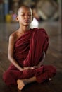 Meditating Buddhist novice in Yangon, Myanmar. Royalty Free Stock Photo