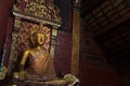 Meditating golden budddha statue Royalty Free Stock Photo