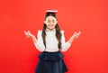 Meditation. Girl child hold book. School girl studying textbook. Kid school uniform hold book. Excited about knowledge Royalty Free Stock Photo