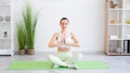 meditation indoors stress relief calm woman yoga