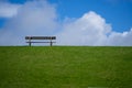 Meditation. Lonely empty wooden bench. Peaceful and quiet place. Loneliness. Calm place. Rest and relax Royalty Free Stock Photo