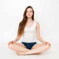 Beautiful girl doing yoga. Meditation in the Lotus position Royalty Free Stock Photo