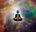 Meditation man with seven chakras and the wonderful of the universe