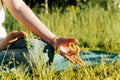 Meditation, outdoors. Close-up of a female hand in a yoga asana pose for Gyan Mudra meditation. Woman meditating in lotus position Royalty Free Stock Photo