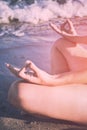 Meditation on a sea beach. Instagram stylization