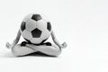 Meditation with a soccer ball instead of a head. Space for text. Royalty Free Stock Photo