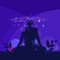 Silhouette of a meditating person surrounded by energy fields