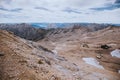 Meditation spot over the rocks on top Zugspitze; Wetterstein mountains, Experienced peoples hiking advenure in Alpen Royalty Free Stock Photo