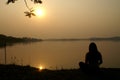 Meditation on Sunset at a lake
