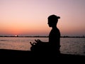 Meditation at sunset Royalty Free Stock Photo