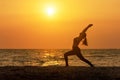 Meditation yoga spirit lifestyle mind woman peace vitality, silhouette outdoors on the Sea sunrise, Royalty Free Stock Photo