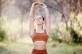 Meditation, yoga and zen woman in nature relaxing, training or stretching her body with freedom for a calm balance Royalty Free Stock Photo