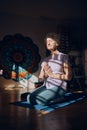 Meditation, zen and elderly woman doing yoga in dark room, shadow and positive energy, balance and mindfulness. Wellness Royalty Free Stock Photo