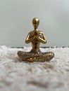 Meditative golden decorative object Royalty Free Stock Photo