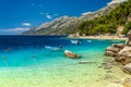 Mediterranean bay and beach with motorboats, Brela, Dalmatia region, Croatia Royalty Free Stock Photo