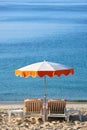 Mediterranean beach chairs sun umbrella