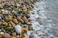 Mediterranean beach - colorful pebbles on the shore. Texture Royalty Free Stock Photo