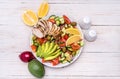 Mediterranean chicken salad with avocado .