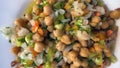 Mediterranean Chickpeas Salad with onion, pepper, tomato, oil, vinegar