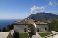 Church Madonna di Montecastello in Tignale on vast lake Garda with scenic Italian Alps in background, Lombardy, Northern Italy