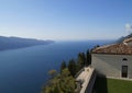 Church Madonna di Montecastello in Tignale on vast lake Garda with scenic Italian Alps in background, Lombardy, Northern Italy