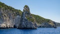 Mediterranean coast with massive rocky cliff and big stones Royalty Free Stock Photo