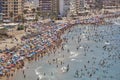 Mediterranean coastline in Spain. Calpe beach. Summer crowd. Ali