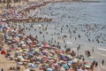 Mediterranean coastline in Spain. Calpe beach. Summer crowd. Alicante Royalty Free Stock Photo