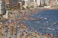 Mediterranean coastline in Spain. Calpe beach. Summer crowd. Alicante