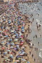 Mediterranean coastline in Spain. Calpe beach. Summer crowd. Alicante