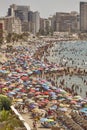 Mediterranean coastline in Spain. Calpe beach. Summer crowd. Alicante