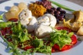 Mediterranean cuisine salad with mozzarella olives artichokes onions Royalty Free Stock Photo