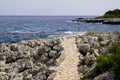 Mediterranean customs path along the water patway to rock beach coast Juan-les-Pins in Antibes France Royalty Free Stock Photo
