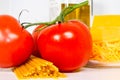 The Mediterranean diet consisting of Tomatoes, Pasta, Cheese and Olive Oil.