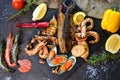 Mediterranean dinner with grilled shrimps, mussels, squids and fish. Royalty Free Stock Photo