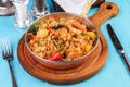 Rice fried with vegetables - greens, carrots, red pepper, onions and seafood Royalty Free Stock Photo