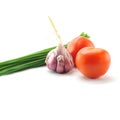 Mediterranean food ingredients: spring onions, garlic and tomato