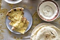 Mediterranean food naan cream cheese on table