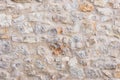 Mediterranean gray natural stone wall facade background texture Royalty Free Stock Photo